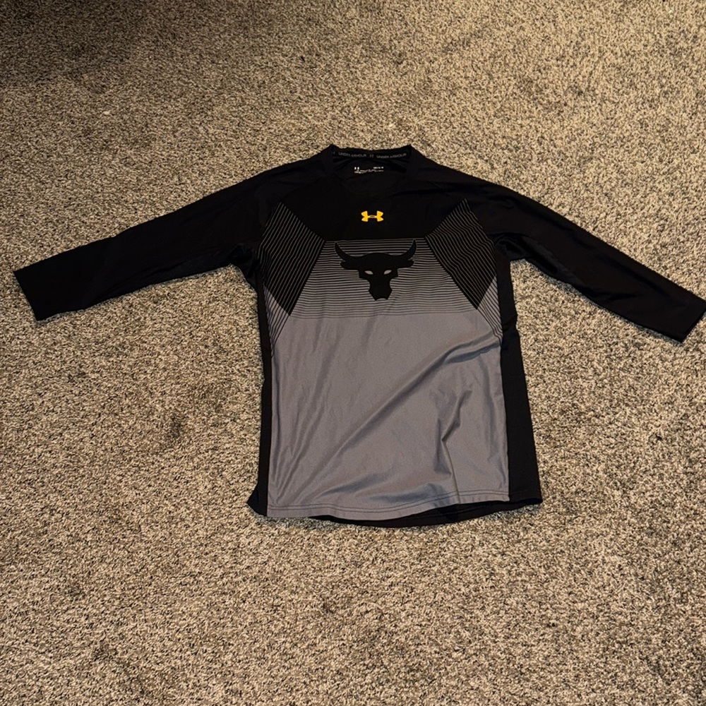 The Rock’s 3/4 Under armour shirt design